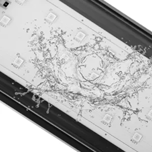 Modern aquarium with water splashes and geometric patterns on a sleek black frame
