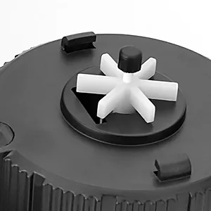 Close-up of Hygger aquarium's black and white circular component with star-shaped white plastic part and black caps
