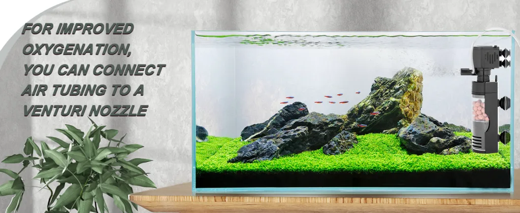 Hygger aquarium with rocks, green plants, and air pump for improved oxygenation