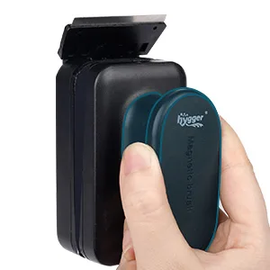 Hand holding Hygger aquarium water quality tester with blue LED display and black case