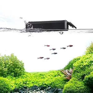 Hygger aquarium with fish swimming underwater, lush green plants, and a floating black device on the water surface