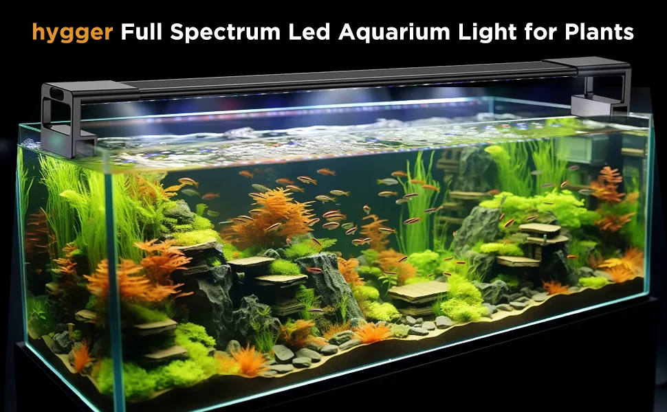 Hygger Full Spectrum LED Aquarium Light for Plants - Vibrant fish tank with lush plants and rocks under bright lighting