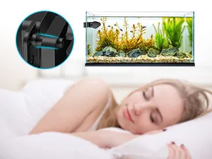 Woman sleeping peacefully with a hygger aquarium on her bedside table, featuring plants and gravel.
