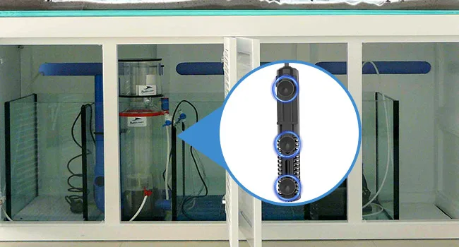 Close-up of Hygger aquarium's water filtration system with three circular filters highlighted, showing internal components fo