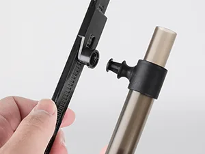 Close-up of Hygger aquarium water level sensor attachment on metal tube with hand holding black component