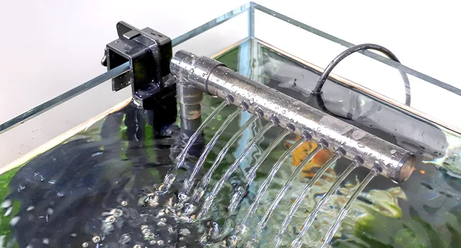 Hygger aquarium water circulation system with multiple spray nozzles creating gentle water flow in a glass tank