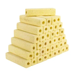 Stacked yellow ceramic aquarium filter media bricks with multiple holes for water filtration
