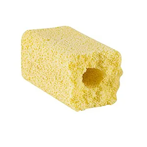 Yellow porous sponge block for aquarium filtration with visible air holes