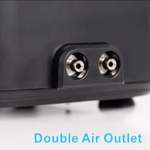 Close-up of a black hygger aquarium's double air outlet with two silver ports for air circulation.