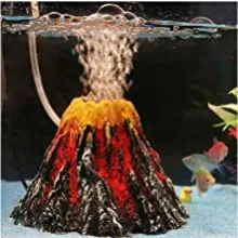 Volcanic-themed aquarium decoration with lava flow effect and fish swimming in water