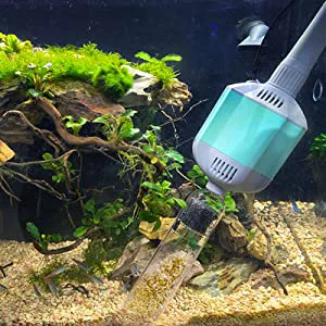 Hygger aquarium water pump with green plants and rocks in a planted tank setup