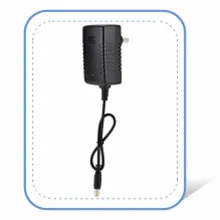 Black AC adapter for aquarium equipment with coiled cable and plug, suitable for fish tank power supply