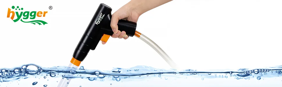 A hand holding a black and orange Hygger aquarium water pump with a clear hose spraying water into a pool of bubbles.