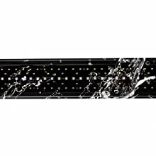 Black marble aquarium frame with gold dots and white marble patterns, modern design for home decor