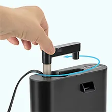 Hand adjusting Hygger aquarium water level sensor with blue arrow indicating water flow