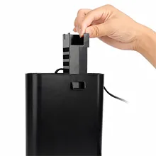 Hand inserting a filter cartridge into a black Hygger aquarium filter unit, showing maintenance process