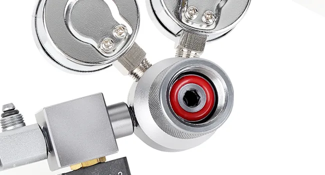 Close-up of hygger aquarium equipment components, including pressure gauges and red valve with metallic finish