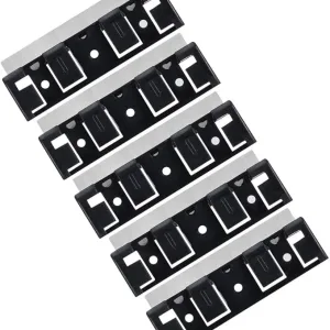Black and white close-up of multiple aquarium filter cartridges arranged in a diagonal pattern, showcasing their design and f