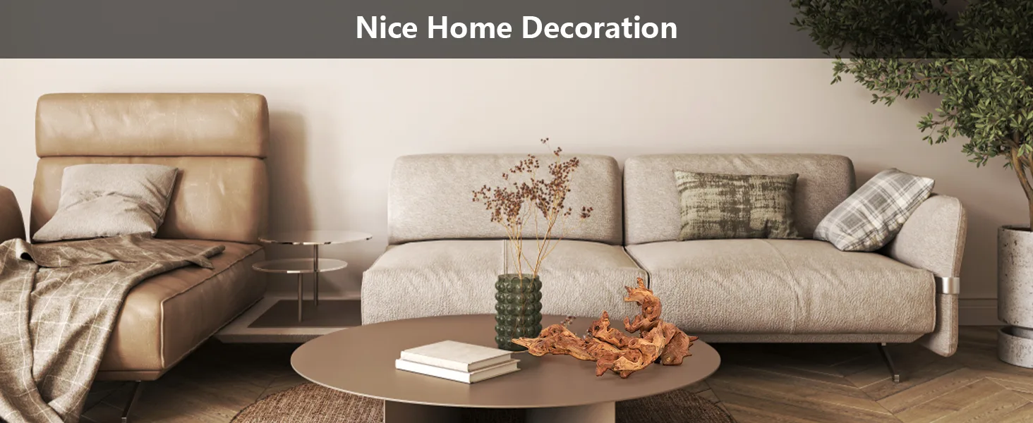 Modern living room with beige sofa, leather chair, coffee table, and decorative plants. Home decor inspiration for cozy inter