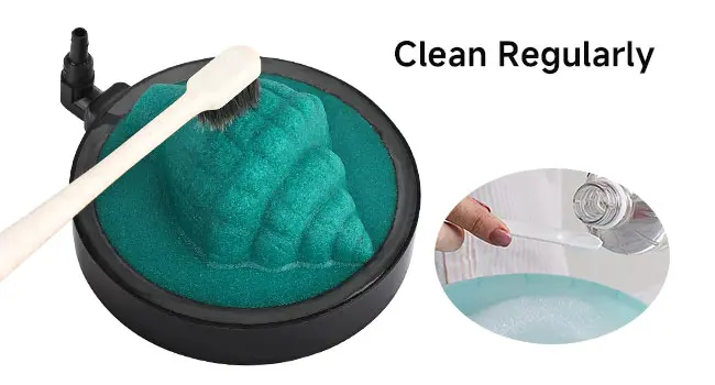 Hygger aquarium filter maintenance: clean sponge with brush and refill water