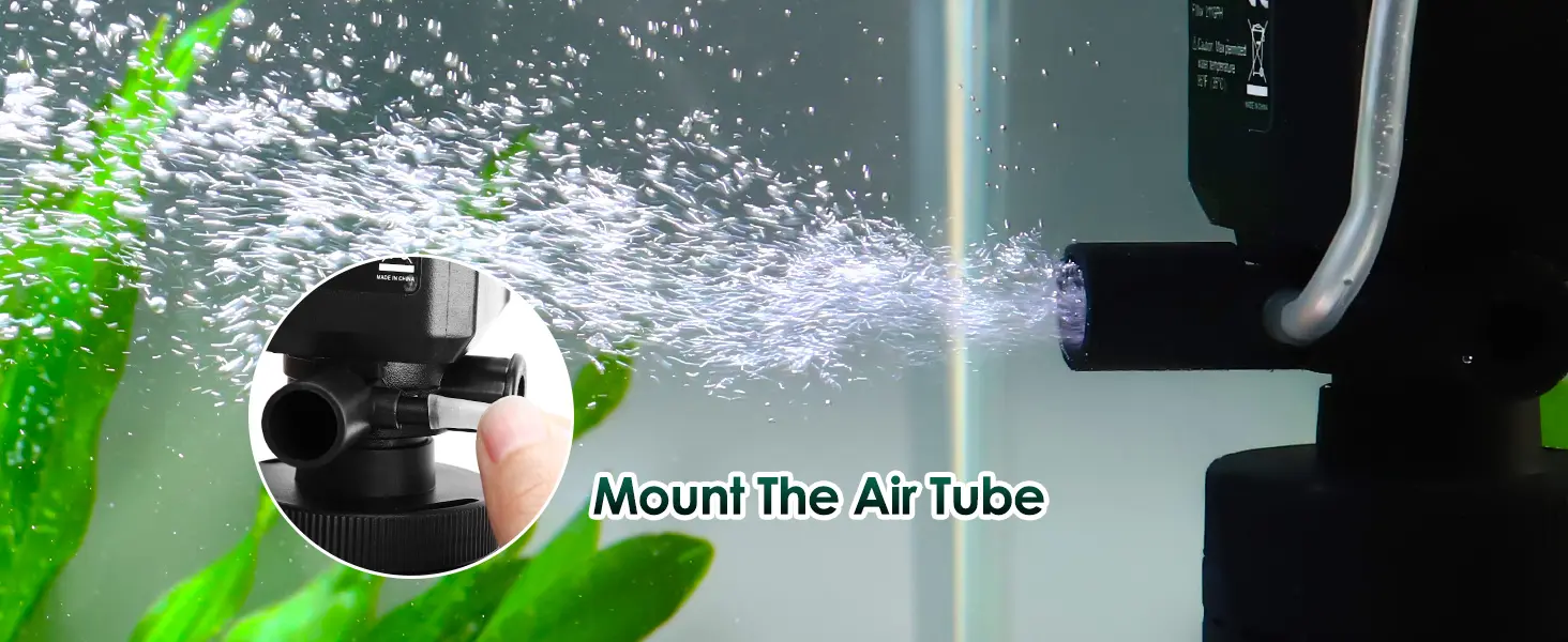 Close-up of air tube installation in aquarium with bubbles and green plants, showing how to mount the air tube for proper aer