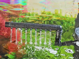 Hygger aquarium water feature with multiple streams flowing into a lush green and red aquatic garden