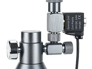 Close-up of the Hygger HC045 aquarium CO₂ regulator with integrated 12V DC solenoid valve, showing control knobs, pressure adjustment ports, and the solenoid component for automatic CO₂ control in planted tanks.